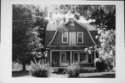 337 FIRST ST, a Dutch Colonial Revival house, built in Waldo, Wisconsin in 1918.