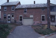 218 E MILL RD, a Boomtown blacksmith shop, built in Galesville, Wisconsin in 1871.