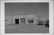 100 W MAIN ST, a Twentieth Century Commercial gas station/service station, built in Arcadia, Wisconsin in .
