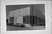 7TH ST, SW CORNER OF SEVENTH AND CHARLES, a Commercial Vernacular retail building, built in Osseo, Wisconsin in .