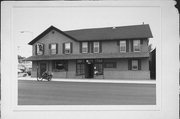 C. 1408 MAIN ST, a Gabled Ell hotel/motel, built in Whitehall, Wisconsin in .