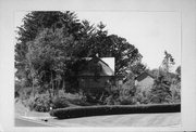 E2666 STATE TRUNK HIGHWAY 162, a Dutch Colonial Revival house, built in Hamburg, Wisconsin in 1910.