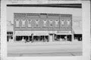113-117 S MAIN ST, a Italianate large retail building, built in Viroqua, Wisconsin in 1885.