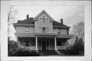 306 S RUSK AVE, a American Foursquare house, built in Viroqua, Wisconsin in 1892.