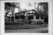 7766 BAYVIEW RD, a Other Vernacular resort/camp building, built in Presque Isle, Wisconsin in 1919.