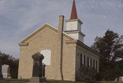 N SIDE OF TOWN LINE RD .1 M E OF CHAPEL DR, E SHORE OF WHITEWATER LAKE, a Greek Revival church, built in Whitewater, Wisconsin in 1855.