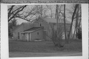 W140 STATE HIGHWAY 11, a Greek Revival house, built in Spring Prairie, Wisconsin in 1844.