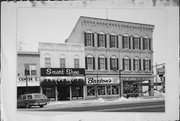 703 MAIN ST, a Italianate large retail building, built in Lake Geneva, Wisconsin in 1872.