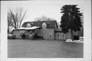 722 S WELLS ST, a Side Gabled lodging-hotel, built in Lake Geneva, Wisconsin in 1950.