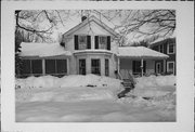 1131 WISCONSIN ST, a Greek Revival house, built in Lake Geneva, Wisconsin in 1859.