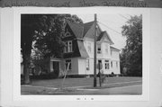 202 N MARTIN ST, a Dutch Colonial Revival house, built in Sharon, Wisconsin in 1900.