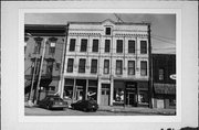 116 W CENTER ST, a Italianate large retail building, built in Whitewater, Wisconsin in 1885.
