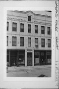 116 W CENTER ST, a Italianate large retail building, built in Whitewater, Wisconsin in 1885.