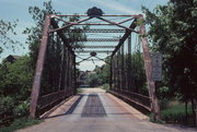 Woodford Drive over the Milwaukee River, a NA (unknown or not a building) bridge, built in Barton, Wisconsin in 1891.