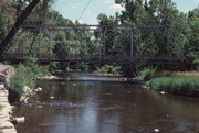 Woodford Drive over the Milwaukee River, a NA (unknown or not a building) bridge, built in Barton, Wisconsin in 1891.