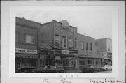 22 N MAIN ST, a Commercial Vernacular small retail building, built in Hartford, Wisconsin in 1887.