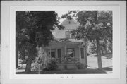 113 STORK ST, a Cross Gabled house, built in Slinger, Wisconsin in 1900.