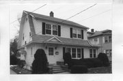 7208 Elmwood Ave, a Dutch Colonial Revival house, built in Middleton, Wisconsin in 1937.