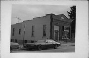 1715 BARTON AVE, a Commercial Vernacular small retail building, built in West Bend, Wisconsin in 1915.