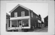 314 COMMERCE ST, a Front Gabled small retail building, built in West Bend, Wisconsin in 1874.