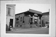 519 Hickory St, a Commercial Vernacular small office building, built in West Bend, Wisconsin in 1908.