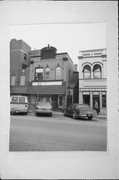 119 - 121 N Main St, a Queen Anne small office building, built in West Bend, Wisconsin in 1894.