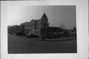 136 S Main St (AKA 135 5th Ave), a Queen Anne retail building, built in West Bend, Wisconsin in 1898.