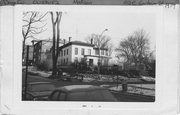 102 E GORHAM ST / 411 N Pinckney St, a Italianate house, built in Madison, Wisconsin in 1853.