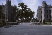 FARRAND LN AND CHURCH ST, SW CNR, a Late Gothic Revival military building, built in Delafield, Wisconsin in 1906.