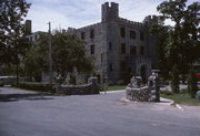 FARRAND LN AND CHURCH ST, SW CNR, a Late Gothic Revival military building, built in Delafield, Wisconsin in 1906.