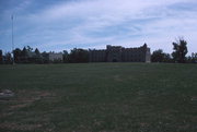 NE CNR OF EXETER AND WILLIAMS STS, a Late Gothic Revival dormitory, built in Delafield, Wisconsin in 1927.