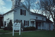 N89 W16840 Appleton Ave., a Greek Revival house, built in Menomonee Falls, Wisconsin in 1857.