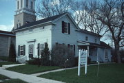 N89 W16840 Appleton Ave., a Greek Revival house, built in Menomonee Falls, Wisconsin in 1857.
