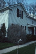 N89 W16840 Appleton Ave., a Greek Revival house, built in Menomonee Falls, Wisconsin in 1857.