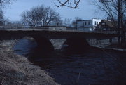 ROOSEVELT DR OVER THE MENOMONEE RIVER, a NA (unknown or not a building) stone arch bridge, built in Menomonee Falls, Wisconsin in 1899.