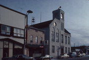 174 E WISCONSIN AVE, a Early Gothic Revival city/town/village hall/auditorium, built in Oconomowoc, Wisconsin in 1886.
