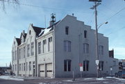 174 E WISCONSIN AVE, a Early Gothic Revival city/town/village hall/auditorium, built in Oconomowoc, Wisconsin in 1886.