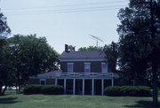 1505 N GOLDEN LAKE RD, a Greek Revival house, built in Summit, Wisconsin in 1850.