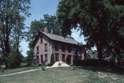 W 230 S 8235 BIG BEND DRIVE, a Greek Revival house, built in Big Bend, Wisconsin in 1842.