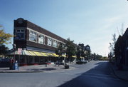 258-279 W BROADWAY AND 265-285 W MAIN ST, a Prairie School retail building, built in Waukesha, Wisconsin in 1914.