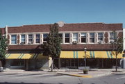 258-279 W BROADWAY AND 265-285 W MAIN ST, a Prairie School retail building, built in Waukesha, Wisconsin in 1914.