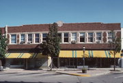 258-279 W BROADWAY AND 265-285 W MAIN ST, a Prairie School large retail building, built in Waukesha, Wisconsin in 1914.