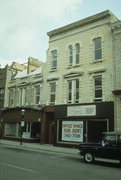 329-333 W MAIN ST, a Italianate small retail building, built in Waukesha, Wisconsin in 1858.