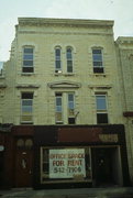 329-333 W MAIN ST, a Italianate small retail building, built in Waukesha, Wisconsin in 1858.