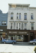 329-333 W MAIN ST, a Italianate small retail building, built in Waukesha, Wisconsin in 1858.