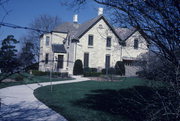 108 N BARSTOW ST, a Tudor Revival house, built in Waukesha, Wisconsin in 1858.