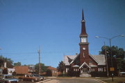 100 E BROADWAY, a Early Gothic Revival house of worship, built in Waukesha, Wisconsin in 1867.