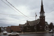 100 E BROADWAY, a Early Gothic Revival house of worship, built in Waukesha, Wisconsin in 1867.