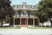 402 WISCONSIN AVE, a Second Empire lodging-hotel, built in Waukesha, Wisconsin in 1883.