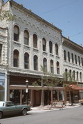 816 N GRAND AVE, a Italianate large retail building, built in Waukesha, Wisconsin in 1870.